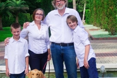 Terri, Bryan and grandsons Ethan and Carter with the puppies